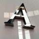 Letra corpórea hueca de acero logo Rendei